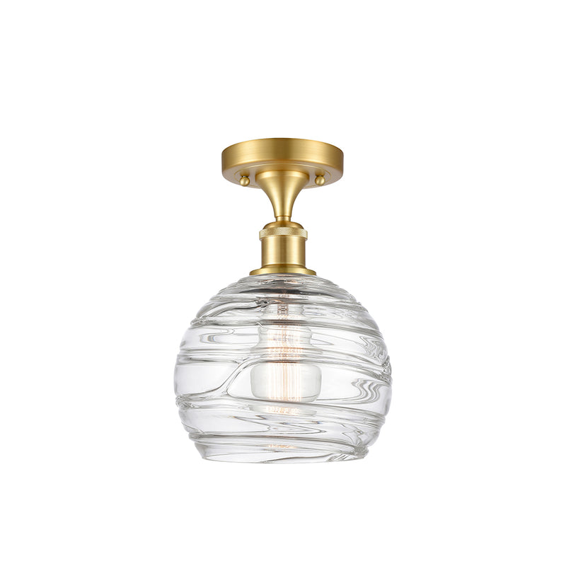 Deco Swirl Semi-Flush Mount shown in the Satin Gold finish with a Clear shade