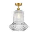 Springwater Semi-Flush Mount shown in the Satin Gold finish with a Clear Spiral Fluted shade