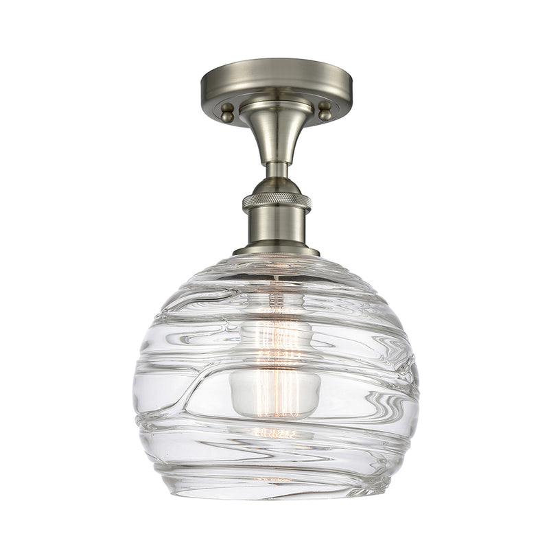 Deco Swirl Semi-Flush Mount shown in the Brushed Satin Nickel finish with a Clear shade