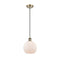 Athens Mini Pendant shown in the Antique Brass finish with a Matte White shade