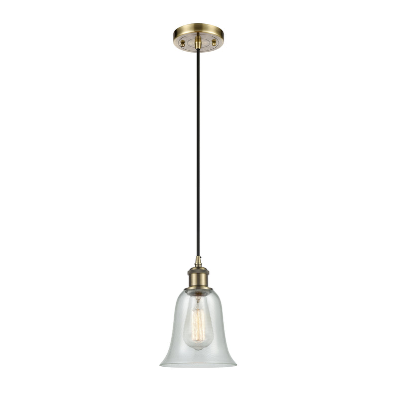 Hanover Mini Pendant shown in the Antique Brass finish with a Fishnet shade