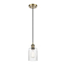 Hadley Mini Pendant shown in the Antique Brass finish with a Clear shade