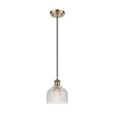 Dayton Mini Pendant shown in the Antique Brass finish with a Clear shade