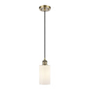 Clymer Mini Pendant shown in the Antique Brass finish with a Matte White shade