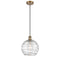 Deco Swirl Mini Pendant shown in the Brushed Brass finish with a Clear shade