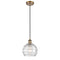 Deco Swirl Mini Pendant shown in the Brushed Brass finish with a Clear shade