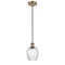 Salina Mini Pendant shown in the Brushed Brass finish with a Clear Spiral Fluted shade