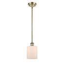 Cobbleskill Mini Pendant shown in the Antique Brass finish with a Matte White shade