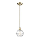 Deco Swirl Mini Pendant shown in the Antique Brass finish with a Clear shade