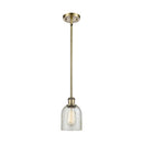 Caledonia Mini Pendant shown in the Antique Brass finish with a Mica shade
