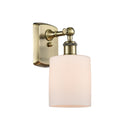 Cobbleskill Sconce shown in the Antique Brass finish with a Matte White shade