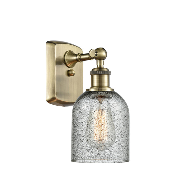 Caledonia Sconce shown in the Antique Brass finish with a Charcoal shade