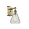 Conesus Sconce shown in the Antique Brass finish with a Clear Crackle shade