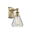 Conesus Sconce shown in the Antique Brass finish with a Clear Crackle shade