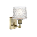 Niagra Sconce shown in the Antique Brass finish with a Clear shade