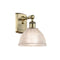 Arietta Sconce shown in the Antique Brass finish with a Clear shade