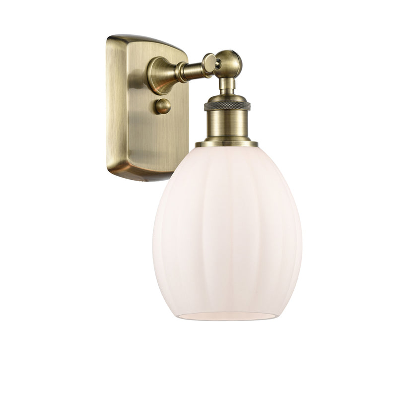 Eaton Sconce shown in the Antique Brass finish with a Matte White shade