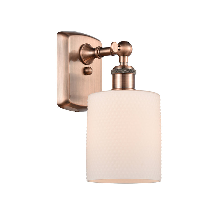 Cobbleskill Sconce shown in the Antique Copper finish with a Matte White shade