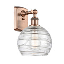 Deco Swirl Sconce shown in the Antique Copper finish with a Clear shade