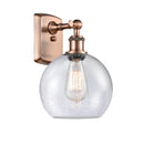 Athens Sconce shown in the Antique Copper finish with a Seedy shade