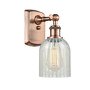 Caledonia Sconce shown in the Antique Copper finish with a Mouchette shade