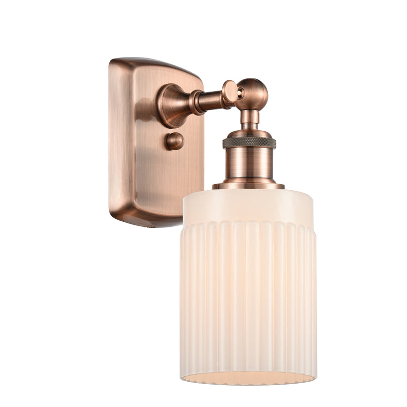 Hadley Sconce shown in the Antique Copper finish with a Matte White shade