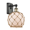 Farmhouse Rope Sconce shown in the Black Antique Brass finish with a White Glass with Brown Rope shade