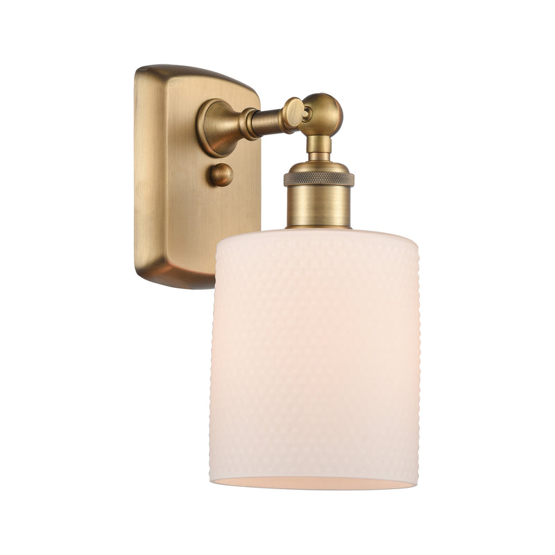 Cobbleskill Sconce shown in the Brushed Brass finish with a Matte White shade