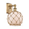 Farmhouse Rope Sconce shown in the Brushed Brass finish with a White Glass with Brown Rope shade