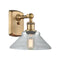 Orwell Sconce shown in the Brushed Brass finish with a Clear shade