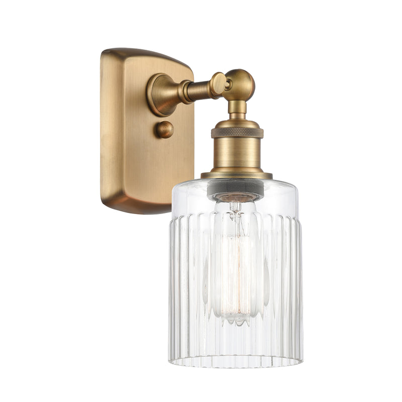 Hadley Sconce shown in the Brushed Brass finish with a Clear shade