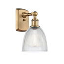 Castile Sconce shown in the Brushed Brass finish with a Clear shade