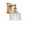 Dayton Sconce shown in the Brushed Brass finish with a Clear shade