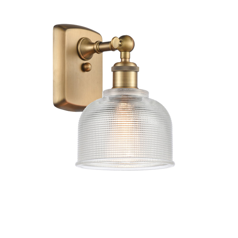 Dayton Sconce shown in the Brushed Brass finish with a Clear shade