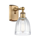 Brookfield Sconce shown in the Brushed Brass finish with a Clear shade