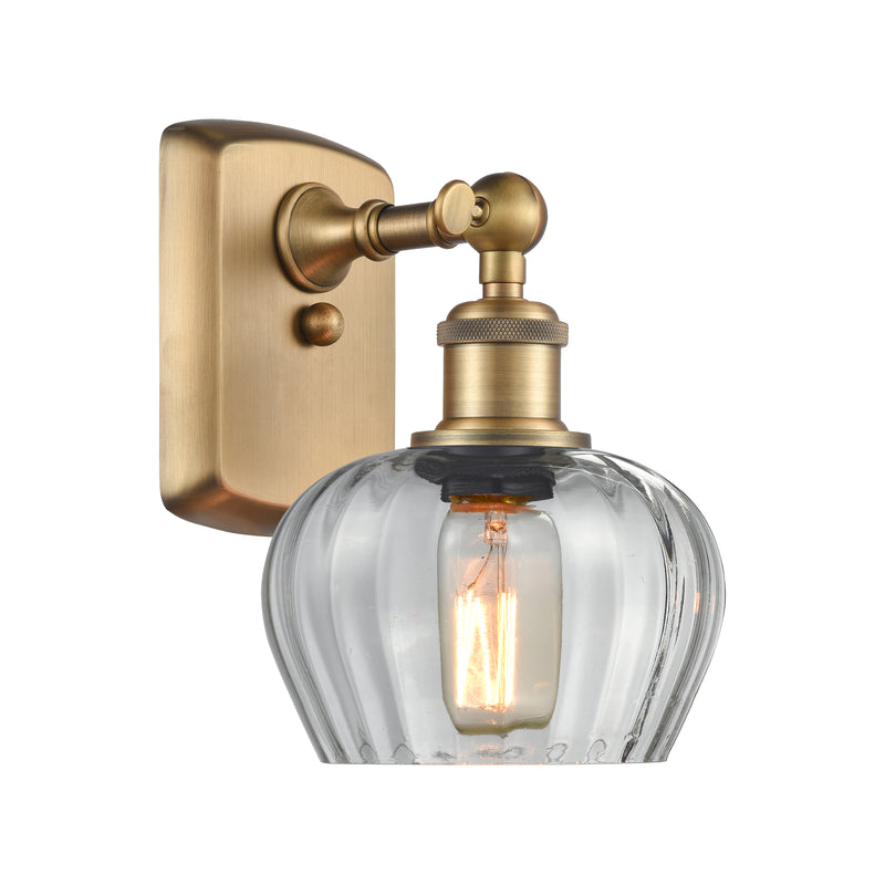 Fenton Sconce shown in the Brushed Brass finish with a Clear shade