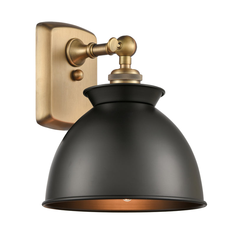 Adirondack Sconce shown in the Brushed Brass finish with a Matte Black shade