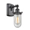 Kingsbury Sconce shown in the Matte Black finish with a Clear shade