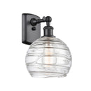 Deco Swirl Sconce shown in the Matte Black finish with a Clear shade