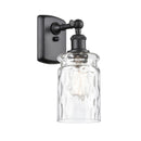 Candor Sconce shown in the Matte Black finish with a Clear Waterglass shade