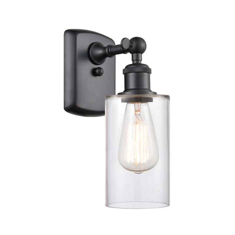 Clymer Sconce shown in the Matte Black finish with a Clear shade