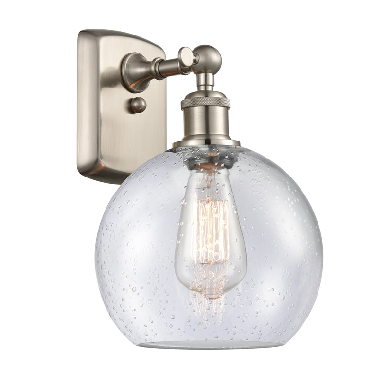 Athens Sconce shown in the Brushed Satin Nickel finish with a Seedy shade