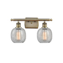 Belfast Bath Vanity Light shown in the Antique Brass finish with a Clear Crackle shade