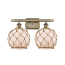 Farmhouse Rope Bath Vanity Light shown in the Antique Brass finish with a White Glass with Brown Rope shade