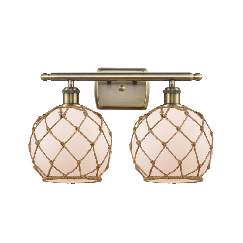 Farmhouse Rope Bath Vanity Light shown in the Antique Brass finish with a White Glass with Brown Rope shade