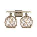 Farmhouse Rope Bath Vanity Light shown in the Antique Brass finish with a Clear Glass with Brown Rope shade
