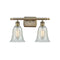 Hanover Bath Vanity Light shown in the Antique Brass finish with a Mouchette shade