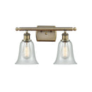 Hanover Bath Vanity Light shown in the Antique Brass finish with a Fishnet shade