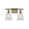 Hanover Bath Vanity Light shown in the Antique Brass finish with a Fishnet shade