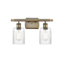Hadley Bath Vanity Light shown in the Antique Brass finish with a Clear shade